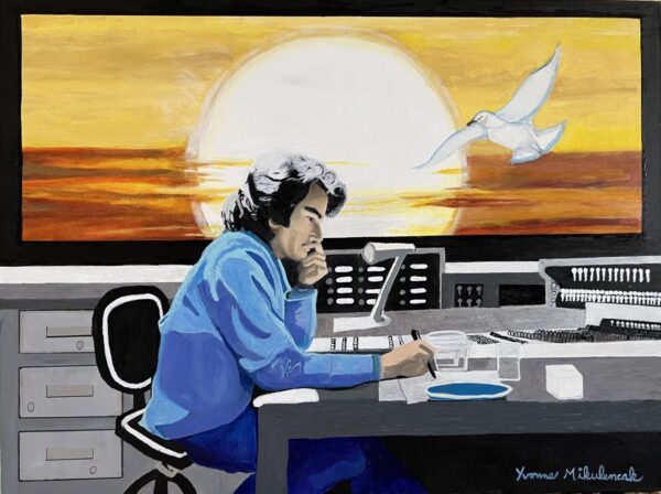 A person wearing a blue sweater is seated at a desk, set against the "Solitary Man" backdrop featuring a sunset mural and a flying dove.